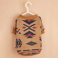 A khaki dog sweater with a retro geometric totem print and brown ribbed trim.
