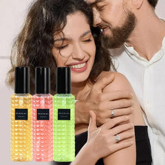Three bottles of Peach Jo perfume with textured glass in yellow, pink, and green.