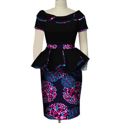 A black off-the-shoulder peplum top and matching pencil skirt featuring a pink and blue dot print.
