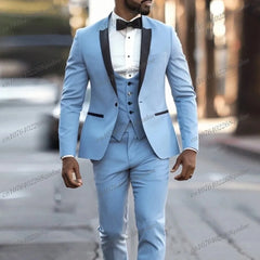 A light blue three-piece suit featuring a black shawl collar, a vest, and matching trousers.