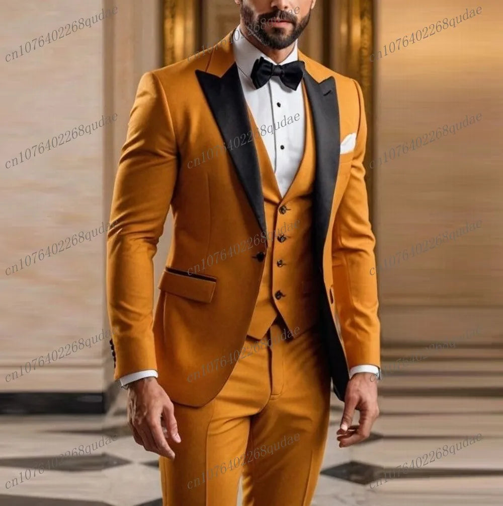A man wears a mustard yellow three-piece suit with a black lapel, white shirt, and black bow tie.