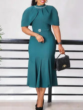 A teal midi mermaid dress with a turtleneck, beaded neckline, and cape sleeves.