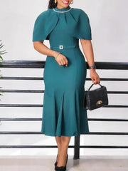 A teal midi mermaid dress with a turtleneck, beaded neckline, and cape sleeves.