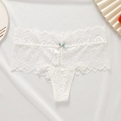 A white low-waist lace thong featuring a small decorative bow at the center front.