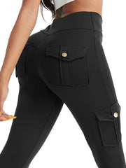 A person wearing black high-waisted cargo leggings with side pockets and gold-tone button details.