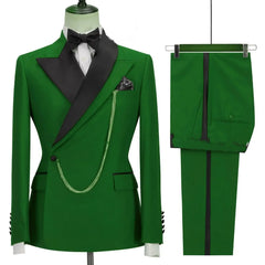 A green double-breasted men's suit with black lapels, a bow tie, and matching trousers.