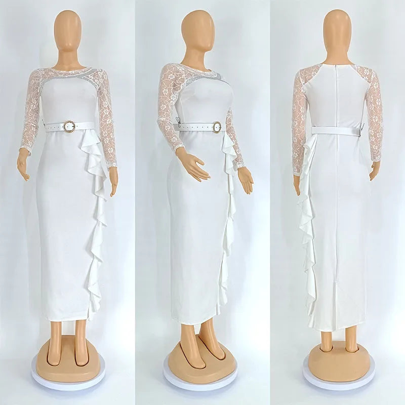 A white long-sleeved midi dress with lace sleeves, a belted waist, and a ruffled side detail.
