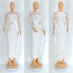 A white long-sleeved midi dress with lace sleeves, a belted waist, and a ruffled side detail.