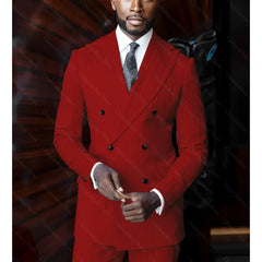 A man wears a red double-breasted pinstripe suit with a peak lapel and a polka dot tie.