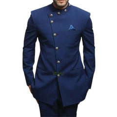 A man wears a blue Jodhpuri suit featuring a mandarin collar and an asymmetrical button closure.