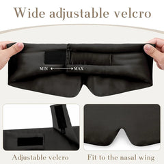 A black silk sleep mask with a wide adjustable velcro strap and a contoured nose bridge.