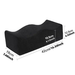 A black, contoured memory foam BBL recovery pillow with dimensions labeled in centimeters and inches.