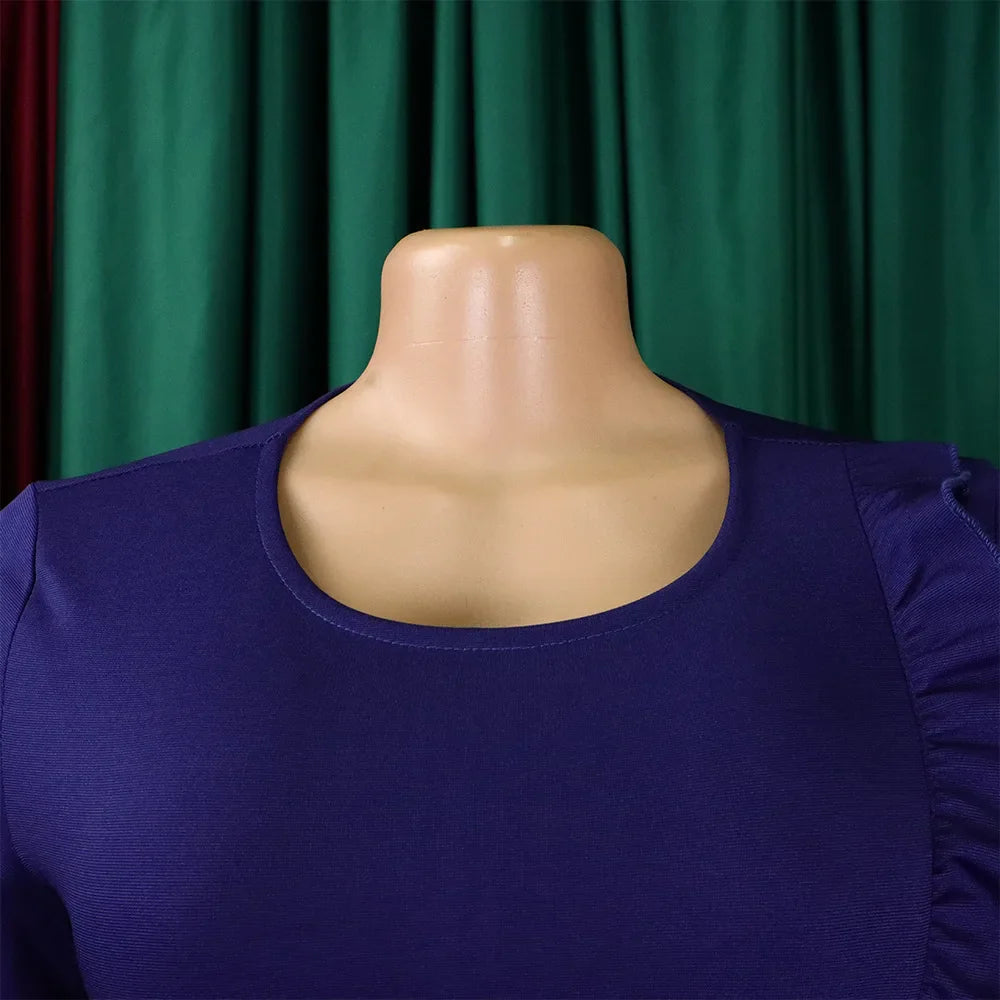 A close-up of a solid purple long-sleeved sheath dress with a round neckline on a mannequin.