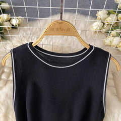 Showlu Fashion women's sleeveless knitted mini dress with A-line bodycon fit, round neck, perfect for streetwear and parties.