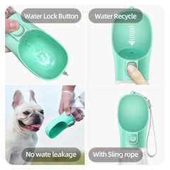 A portable mint green dog water bottle with a leakproof design and a carrying strap.
