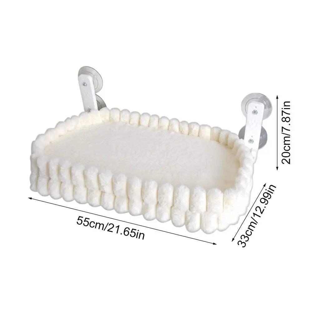 A white plush cat window hammock with suction cups, measuring 55cm by 33cm by 20cm.