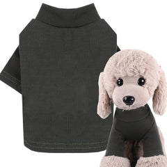 A dark green ribbed turtleneck sweater for dogs shown next to a plush toy wearing the same item.