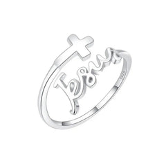 A silver-colored ring featuring a cross and the word Jesus in cursive script.