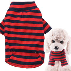 A red and navy blue striped ribbed sweater for dogs shown next to a plush toy wearing the item.
