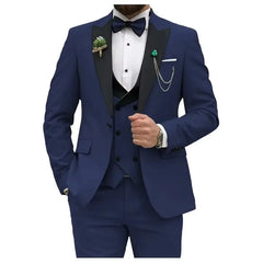 A royal blue three-piece slim fit suit featuring a black peak lapel blazer, vest, and trousers.