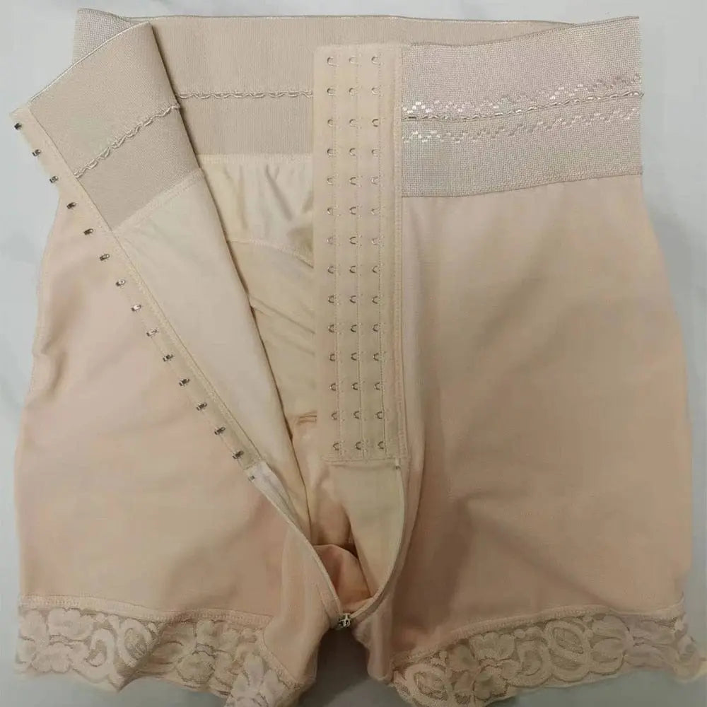 The Slimming Fajas Lace Butt Lifter offers an hourglass figure with nude, high-waisted, lace-trimmed shorts featuring a front panel with 3 rows of hook-and-eye closures for adjustable, wire-free shaping.