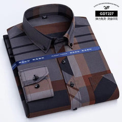 A long-sleeved men's button-down shirt featuring a brown and grey plaid pattern.
