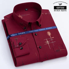 A long-sleeved, slim-fit burgundy men's shirt featuring a gold-plated geometric print.
