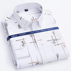 A white long-sleeve men's shirt with a gold and black geometric print and a square collar.