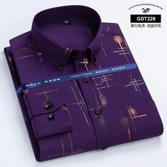 A long-sleeved purple men's button-down shirt featuring a gold-toned geometric print.