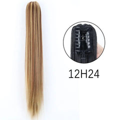 A long, straight, blonde-highlighted synthetic ponytail hair extension with a claw clip attachment.