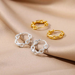 Two pairs of stainless steel hoop earrings with a textured chain-link design in gold and silver.