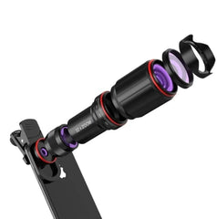 The Ultra Crystal HD 32x Zoom Telescope Mobile Phone Camera Lens Set, featuring detachable multi-section design and purple-tinted glass, is clipped onto a smartphone camera with an exploded view revealing its components.
