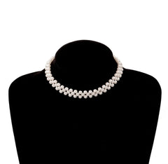 The Vintage Style Simple 6MM Pearl Chain Choker Necklace features evenly spaced white pearls, creating an elegant and classic look for women—perfect for weddings or everyday fashion.