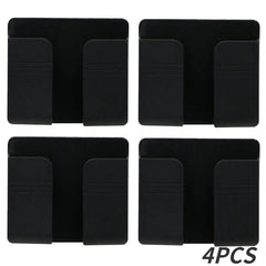 Four black wall-mounted mobile phone holders arranged in a grid.