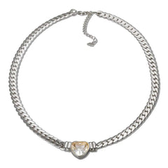 A silver-toned chain necklace featuring a central heart-shaped pendant with a clear stone.