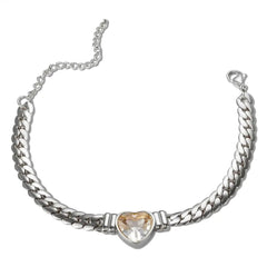 A silver-toned chain bracelet featuring a central heart-shaped crystal pendant.
