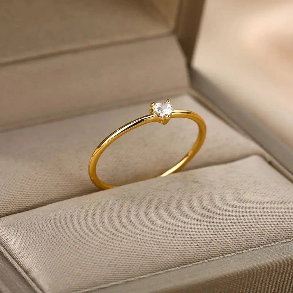The Zircon Engagement Wedding Ring for women features a gold color stainless steel band with cubic zirconia, presented in a beige jewelry box—perfect as a 2023 birthday gift with free shipping.