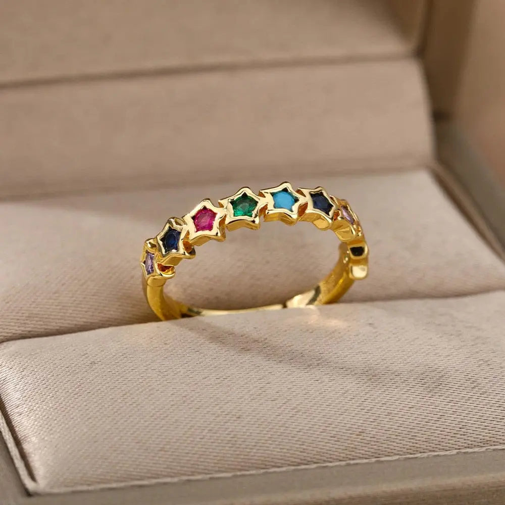 The Zircon Engagement Wedding Ring for Women features gold color stainless steel, sparkling with cubic zirconia, making it a unique choice for weddings or birthdays. Arrives in a beige jewelry box with free shipping.