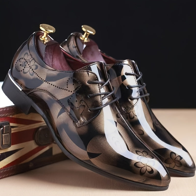 A pair of men's pointed-toe faux leather oxford dress shoes featuring a glossy floral pattern.