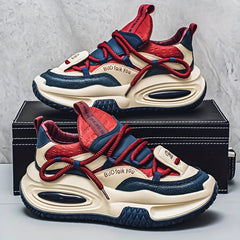A pair of red, blue, and cream mid-top sneakers with thick, shock-absorbing soles.
