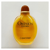 A bottle of Obsession for Men by Calvin Klein eau de toilette spray with amber liquid.