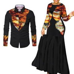A man's long-sleeved shirt and a woman's long maxi dress featuring matching orange print accents.