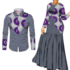 A man's long-sleeved shirt and a woman's long maxi dress in matching grey and purple print.