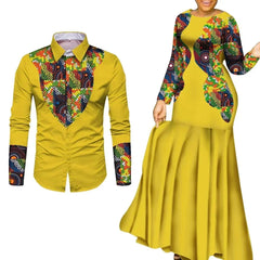 A man's mustard yellow shirt and a woman's matching long-sleeved maxi dress with colorful prints.