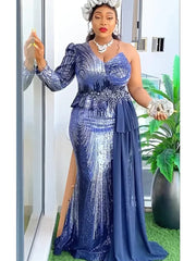 A woman wears a one-shoulder blue sequined evening gown with a peplum waist and chiffon side drape.