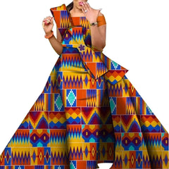 A woman wears a floor-length, off-the-shoulder dress featuring a vibrant, multicolored African print.