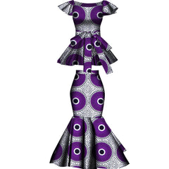 A two-piece set featuring a purple and white patterned peplum top and a matching flared skirt.