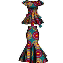 A two-piece set featuring a peplum top and a flared skirt in a colorful African wax print pattern.