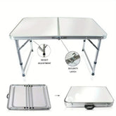 A white aluminum folding table with adjustable legs and a security latch for portability.
