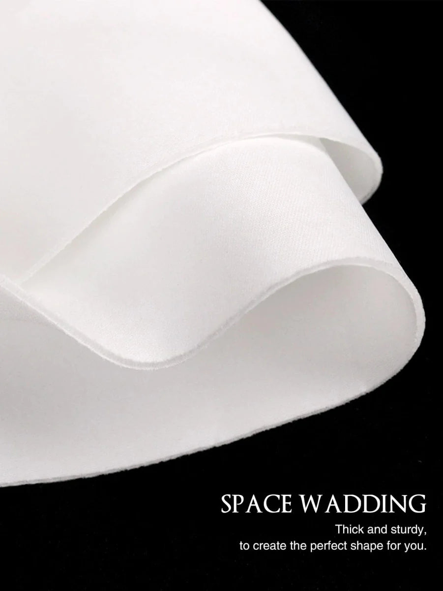 A close-up of thick, white space cotton fabric with a smooth texture.